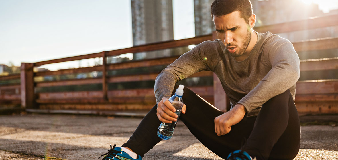 man sitting after run