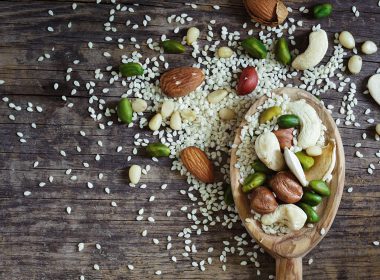 Wooden spoon with seeds and nuts