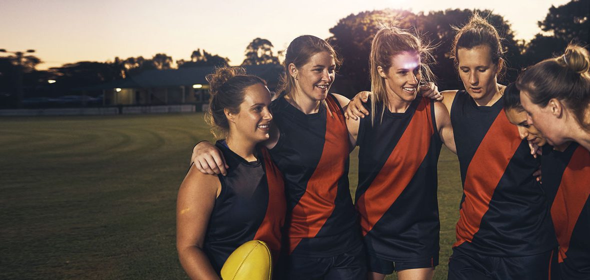 group of women on a sports field