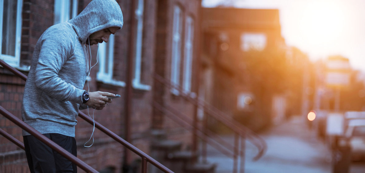 man jogging down stairs