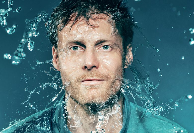Image of a soaked Law Graduate