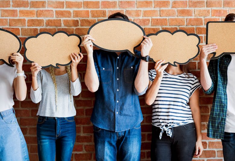 People standing with speech bubbles