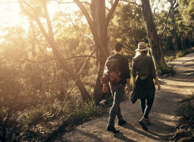 Man and woman walking on a nature trail