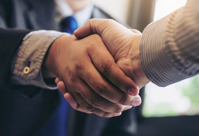 Two men shaking hands