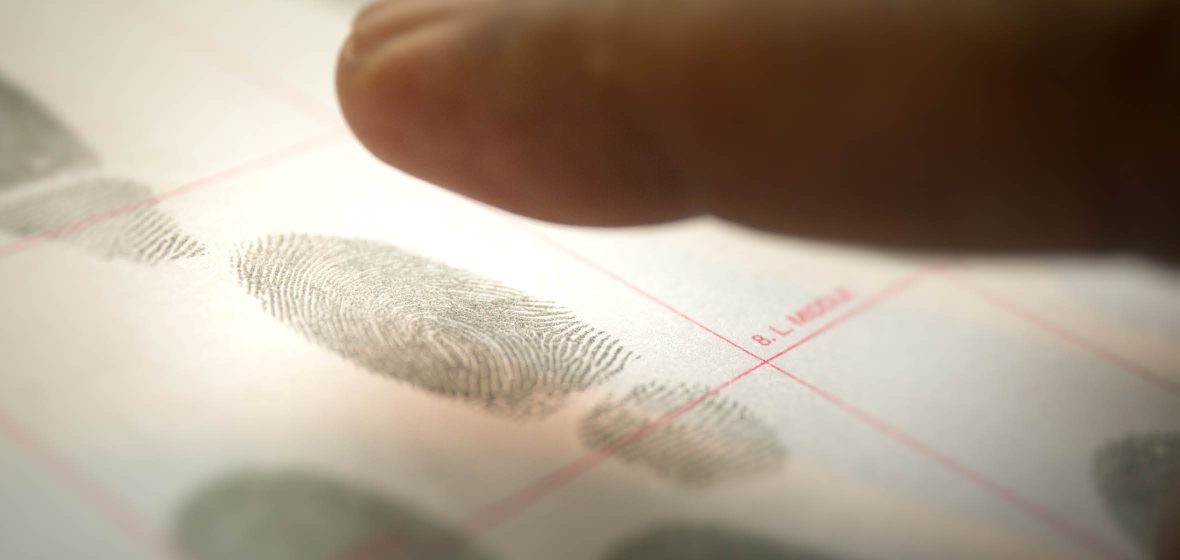 Male getting fingerprinted