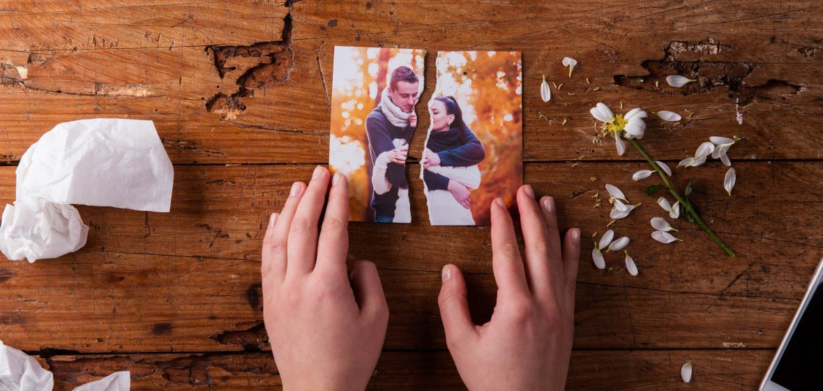 Photo of a couple torn in half