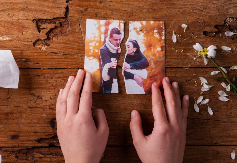 Photo of a couple torn in half