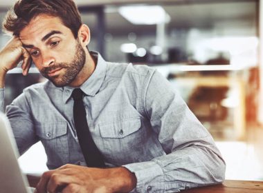 stressed man at desk