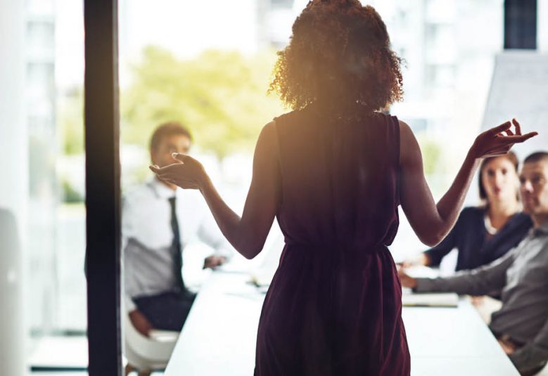woman presenting to room