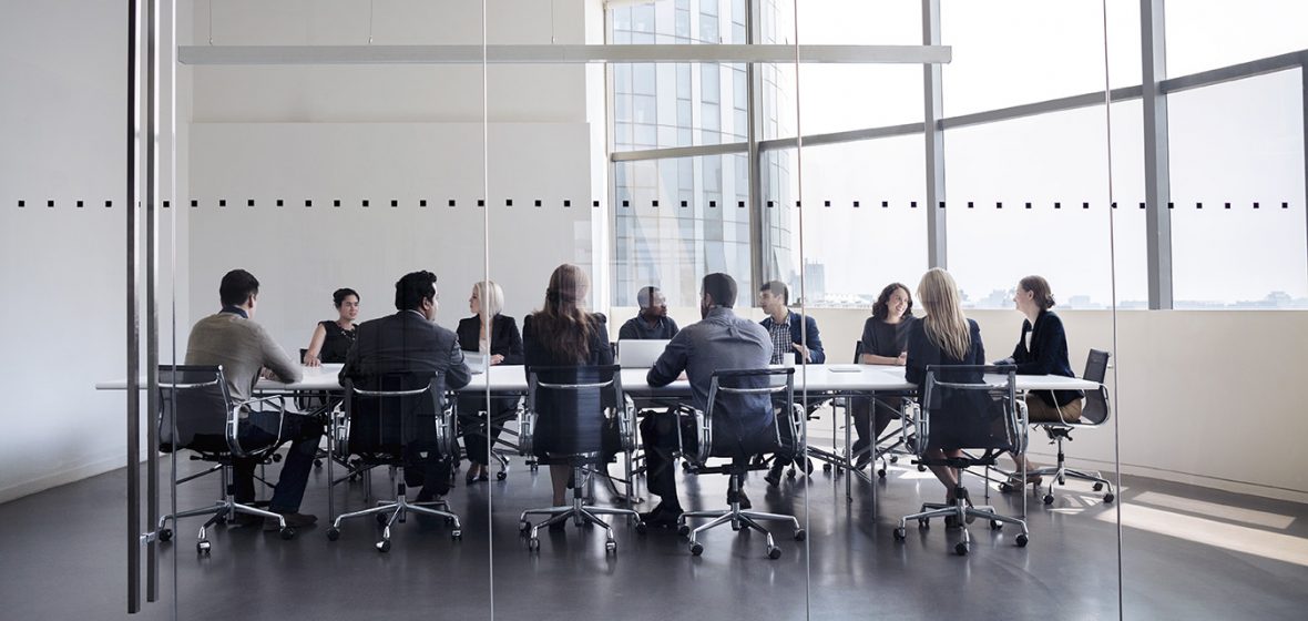 Colleagues at business meeting in conference room