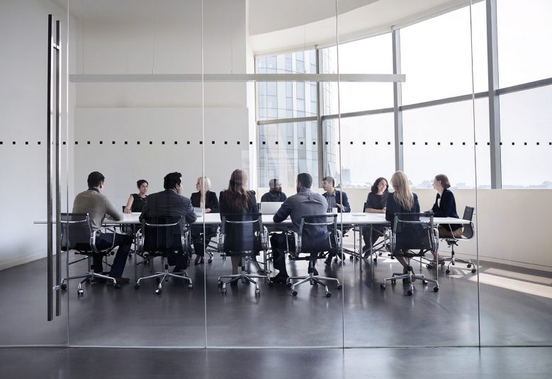 Colleagues at business meeting in conference room