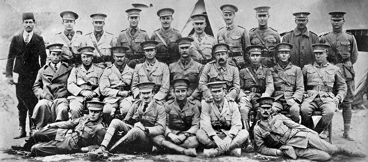 Group portrait of some of the original and 1st Reinforcement officers of the 7th Light Horse Regiment at Maadi. Identified left to right, back row: Second Lieutenant (2nd Lt) Alan Thorne, C Squadron (later Lt, killed in action 27 April 1915); 2nd Lt John Oswald Stevenson C Squadron (later Captain (Capt)); 2nd Lt Nathaniel Dunbar Barton (later Major (Maj)); 2nd Lt Alan Kendrick Evelyn Maney-Lake; 2nd Lt Percy Joseph Higgins, A Squadron; 2nd Lt Hubert Charles Griffiths Weston, B Squadron; Lt Patrick Thomas Elliott, B Squadron; Maj Luke Bice and Lt Arthur Leeman Fulton. Second row: Capt Harold Charles de Low; Capt Arthur Wellesly Hyman; Maj Thomas Lloyd Forster Rutledge; Colonel George Macleay Arthur Onslow; Lieutenant Colonel John McLean Arnott; Major Edward Windeyer; Maj Harold Bruce Suttor; Capt Sydney Joseph Gilbert, Veterinary Officer; Capt John Dalzell Richardson, A Squadron. Front row: Lt William George Board, adjutant, 2nd Lt Thomas Harold Bird,A Squadron; Capt Hugo Flecker, Medical Officer; Lt Horace William Gilchrist, A Squadron (later died of wounds 29 June 1915) and Lt Harry Vernon Jackson.