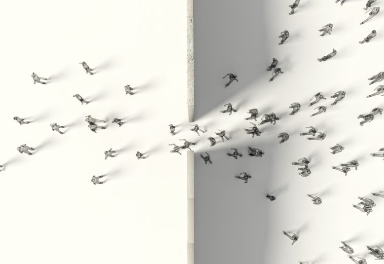 aerial view of people walking through a gap in a dividing wall