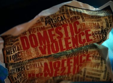 Fictional newspaper with domestic violence headline