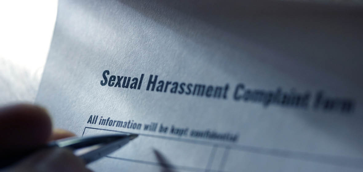 Pen filling in sexual harassment complaint form