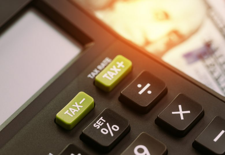 Close-up of calculator with tax buttons