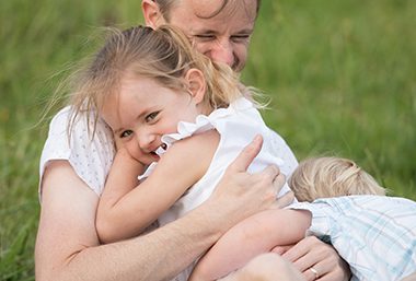 Amity Rogers hugs her father, solicitor Jackson Rogers