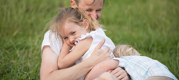 Amity Rogers hugs her father, solicitor Jackson Rogers