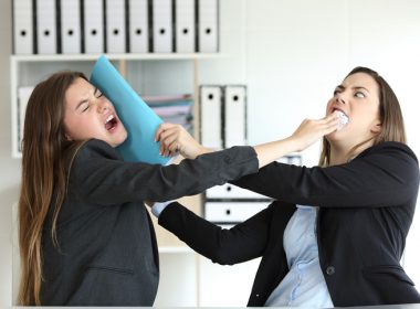 Two angry executives fighting at office