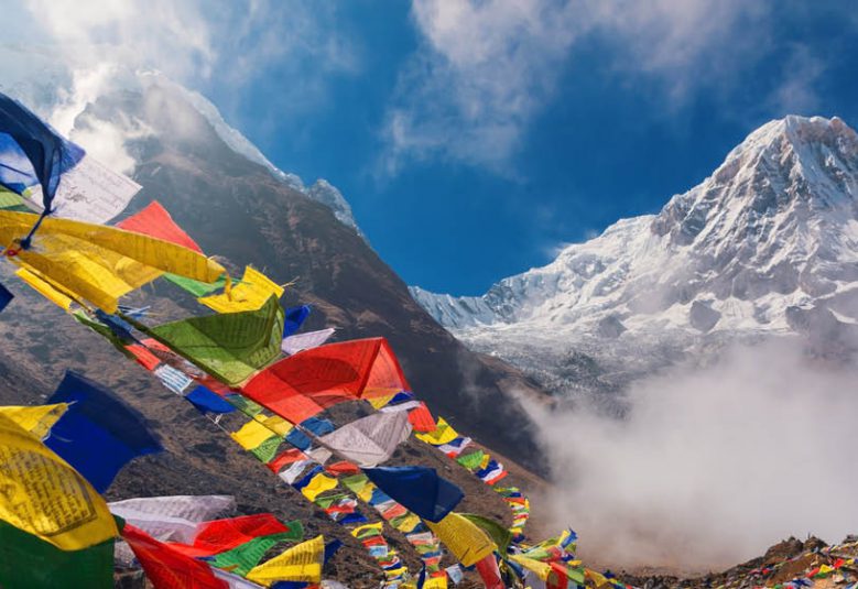 Himalayan prayer flags with Mt Annapurna in the background