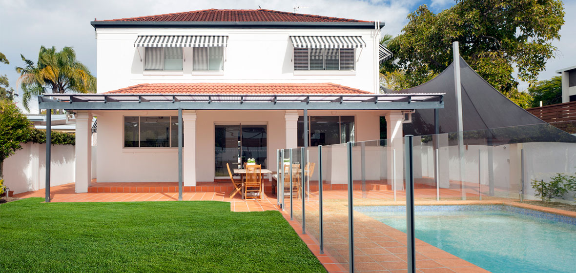 Backyard swimming pool with fence