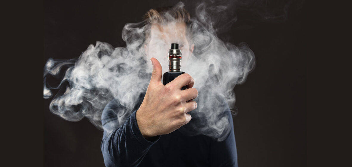 photo showing person using vaping products