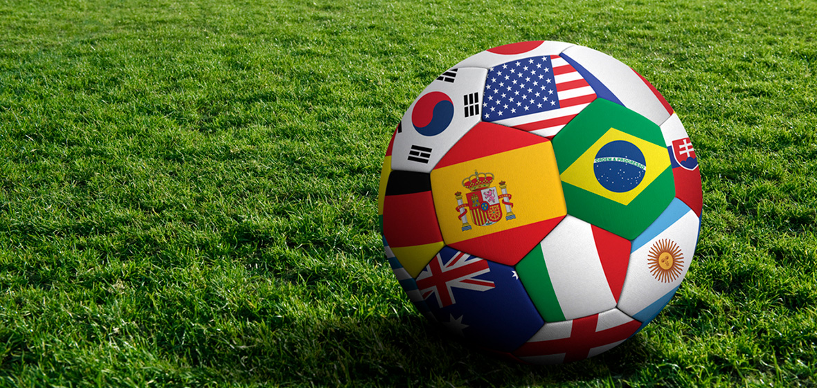 photo of soccer ball with world flags to illustrate World Cup soccer