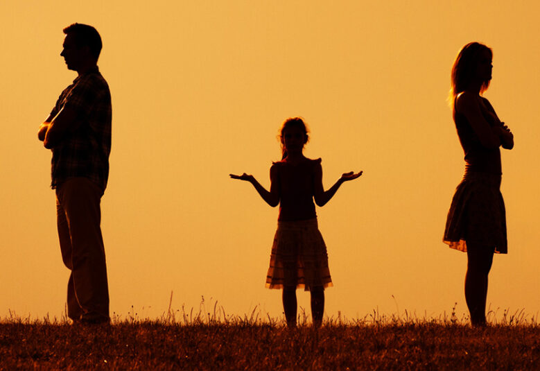 photo of man and women with child between them to symbolise family dispute resolution