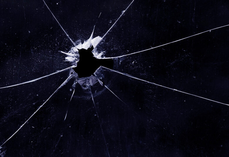 photo of bullet hole in window to show gun licence issues