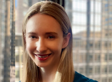 phot of Cate Clousdale with city buildings in background