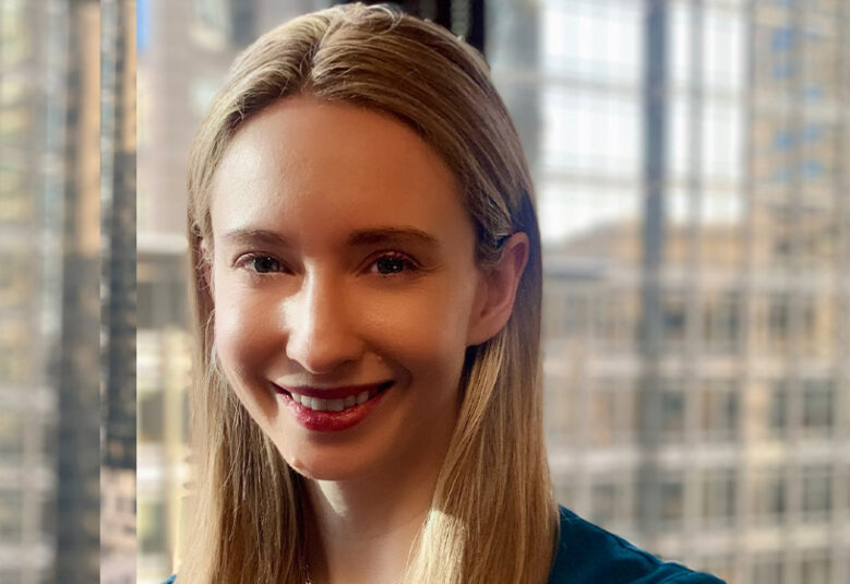 phot of Cate Clousdale with city buildings in background